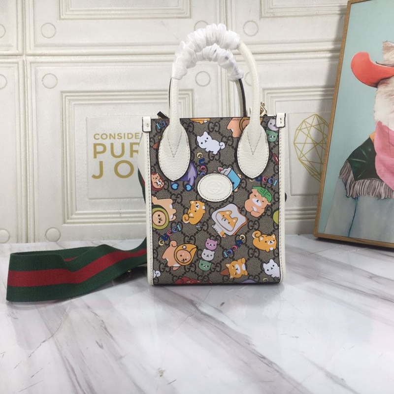 G*u*i top handle bags